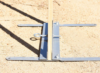 The folding target stand will support targets twenty inches wide and features a hinged support bracket that allows you to fold it compactly.